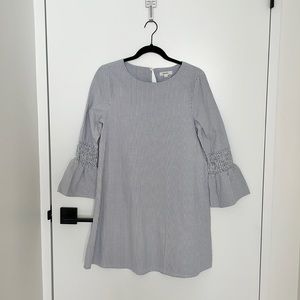 Stripped dress with ruffled detail on sleeves